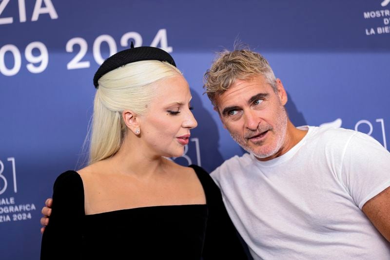 Lady Gaga, from left, and Joaquin Phoenix pose for photographers at the photo call for the film 'Joker: Folie A Deux' during the 81st edition of the Venice Film Festival in Venice, Italy, on Wednesday, Sept. 4, 2024. (Photo by Vianney Le Caer/Invision/AP)