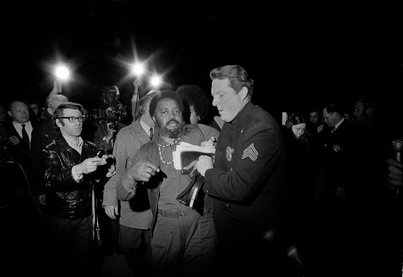 Program director of the Southern Christian Leadership Conference Hosea Williams is escorted out of New York's St. Patrick's Cathedral, April 4, 1971, after disrupting Palm Sunday services at the cathedral on the anniversary of Martin Luther King Jr.'s assassination.