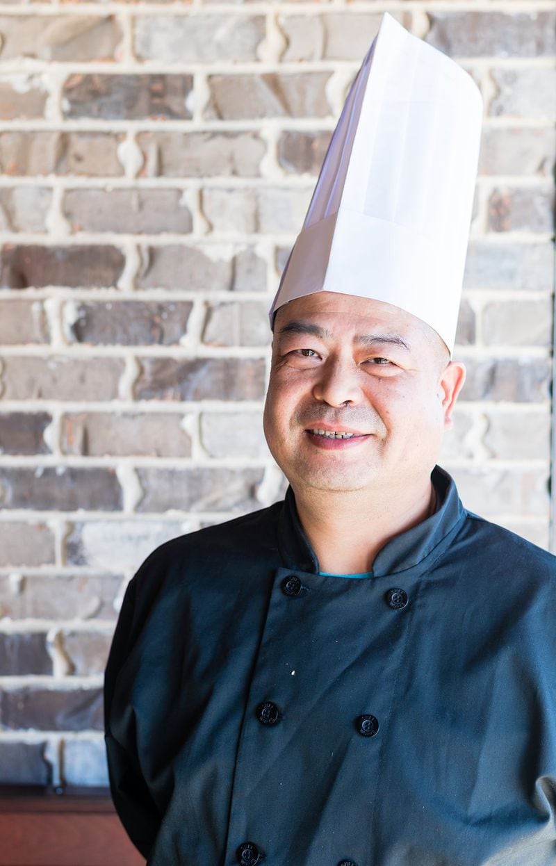 Chef Wen-Qiang Huang of Fire Stone Chinese in Kennesaw has worked with well-known Chinese chef Peter Chang. CONTRIBUTED BY HENRI HOLLIS