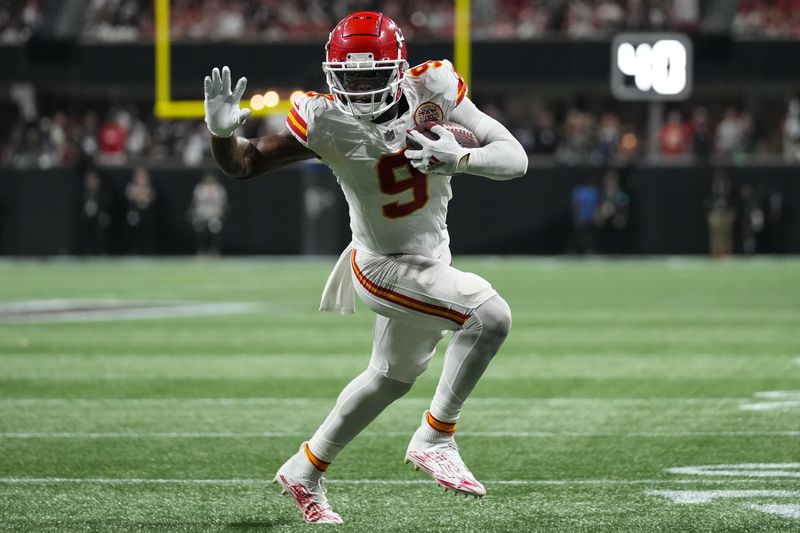 Kansas City Chiefs wide receiver JuJu Smith-Schuster (9) runs toward the end zone for a touchdown against the Atlanta Falcons during the second half of an NFL football game, Sunday, Sept. 22, 2024, in Atlanta. (AP Photo/Brynn Anderson)