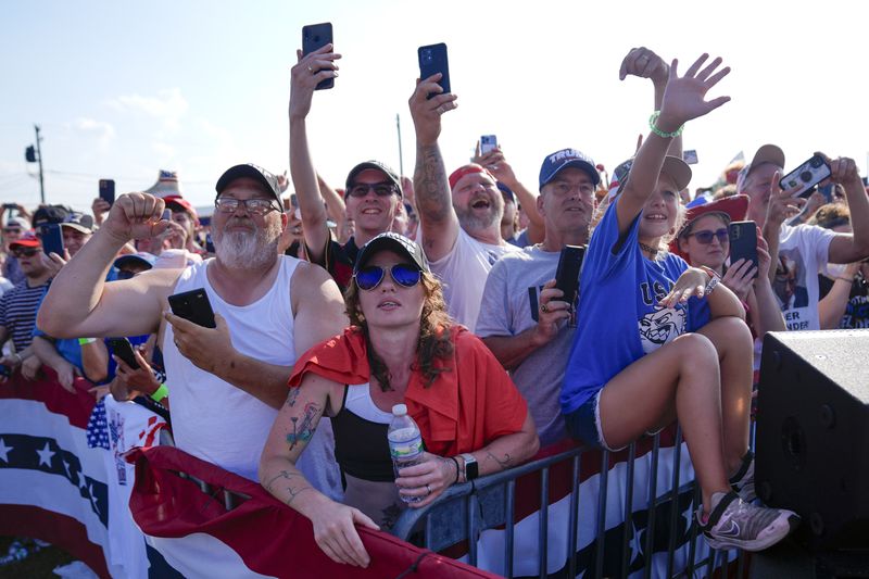 FILE - Supporters cheer as Republican presidential candidate former President Donald Trump arrives for a campaign rally, July 13, 2024, in Butler, Pa. (AP Photo/Evan Vucci, File)