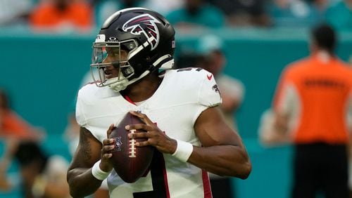 Atlanta Falcons quarterback Michael Penix Jr. (9) looks to pass the ball during the first half of a pre season NFL football game against the Miami Dolphins, Friday, Aug. 9, 2024, in Miami Gardens, Fla. (AP Photo/Lynne Sladky)