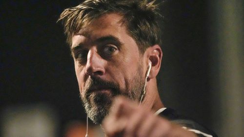 New York Jets quarterback Aaron Rodgers walks outside of the locker room at Bank of America Stadium before a preseason NFL football game against the Carolina Panthers, Saturday, Aug. 17, 2024, in Charlotte, N.C. (AP Photo/Mike Stewart)