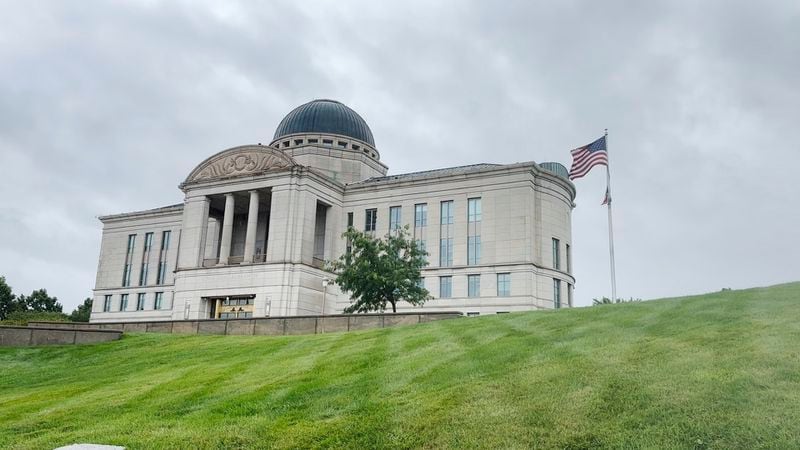 The national flag flies in front of the Iowa Supreme Court building, Friday, June 28, 2024, in Des Moines, Iowa. The court on Friday said the state's strict abortion law is legal and told a lower court to dissolve a temporary block on the law. (AP Photo/Scott McFetridge)
