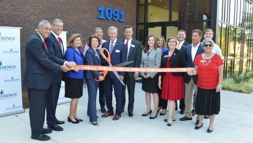 Arylessence holds a ribbon cutting in 2018 for the opening of its research and development center in Cobb County.