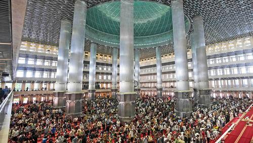 Muslim men attend Friday prayer at Istiqlal Mosque in Jakarta, Indonesia, Friday, Aug. 9, 2024, where Pope Francis is scheduled to hold an interfaith meeting on Sept. 5. (AP Photo/Tatan Syuflana)