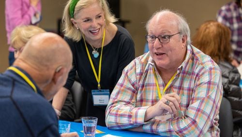 Volunteer Marci Nunnery helps member Doug Jones with art project during a Respite Care Atlanta meeting at Second-Ponce de Leon Baptist Church in Atlanta. 
PHIL SKINNER FOR THE ATLANTA JOURNAL-CONSTITUTION