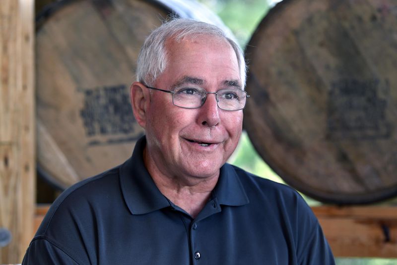 Eddie Russell, master distiller, and son of 89-year-old Jimmy Russell, the "Buddha of Bourbon" talks about having three generations of the Russell family involved in the bourbon industry at the Wild Turkey Distillery in Lawrenceburg, Ky., Wednesday, Aug. 28, 2024. (AP Photo/Timothy D. Easley)