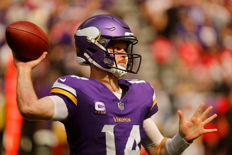 Minnesota Vikings quarterback Sam Darnold (14) throws a pass during the second half of an NFL football game against the San Francisco 49ers, Sunday, Sept. 15, 2024, in Minneapolis. (AP Photo/Bruce Kluckhohn)