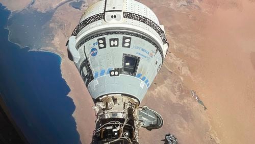 FILE - This photo provided by NASA shows the Starliner spacecraft docked to the Harmony module of the International Space Station, orbiting 262 miles above Egypt's Mediterranean coast, on June 13, 2024. (NASA via AP, File)