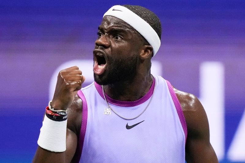 Frances Tiafoe, of the United States, reacts after scoring a point against Taylor Fritz, of the United States, during the men's singles semifinal of the U.S. Open tennis championships, Friday, Sept. 6, 2024, in New York. (AP Photo/Frank Franklin II)