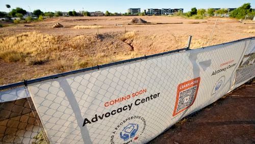 The lot of the future victims' advocacy center is shown, Wednesday, Sept. 4, 2024 in Gilbert, Ariz. The town has obligated only one-quarter of funds received through the American Rescue Plan for projects, according to the most recent data from the federal government. Construction on the dirt lot near its fire department for the advocacy center remain unrealized. (AP Photo/Matt York)