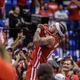 Puerto Rico's Jose Alvarado celebrates after his team qualified for the Paris 2024 Olympics after eliminating Lithuania in a FIBA Olympic Qualifying basketball final in San Juan, Puerto Rico, Sunday, July 7, 2024. (AP Photo/Alejandro Granadillo)