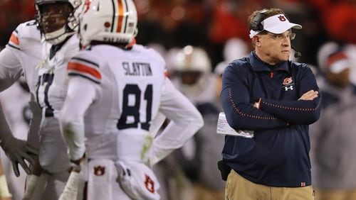 Auburn head coach Guz Malzahn looks on during a time out against Georgia during a 27-10 loss Saturday, Nov. 10, 2018, in Athens.