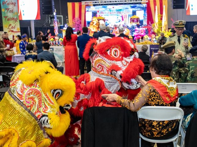 After their performance, the lions approach the audience for lucky money during the Lunar New Year celebration, hosted by The Vietnamese American Community of Georgia at Plaza Las Americas in Lilburn on Saturday, Feb 3, 2024 where dragon and lion dancing begins the weekend.  The celebration continues on Sunday and includes traditional food, music and cultural festivities.  (Jenni Girtman for The Atlanta Journal-Constitution)