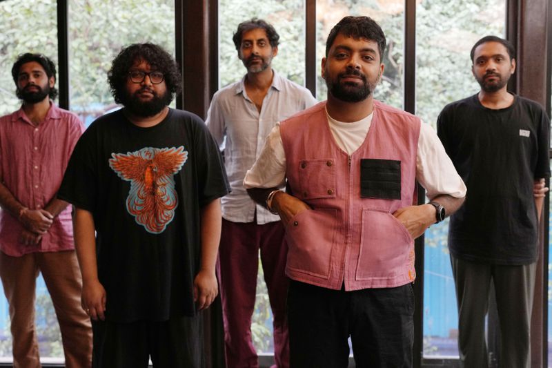 From left, Dhruv Bhola, Kartik Pillai, Suryakant Sawhney, Karan Singh, and Rohit Gupta of Peter Cat Recording Co pose for a photograph in Mumbai, India, Friday, Aug. 2, 2024. (AP Photo/Rajanish Kakade))