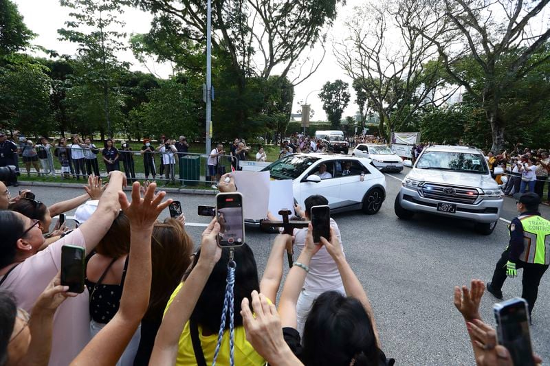 Pope Francis and entourage arrive at St Theresa's Home in Singapore, Friday, Sept. 13, 2024. (AP Photo/Suhaimi Abdullah)