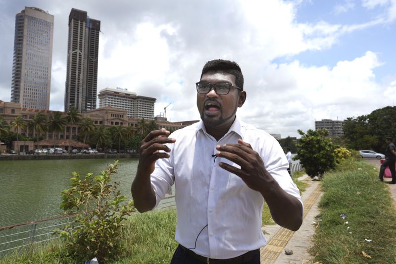 Pathum Kerner, a 42-year-old physician who was among the first Sri Lankans to join the public uprising that ended President Gotabaya Rajapaksa's regime and a key figure in starting the "Go home, Gota", talks to Associated Press at the 2022 protest site, in Colombo, Sri Lanka, Monday, Sept. 16, 2024. (AP Photo/Rajesh Kumar Singh)