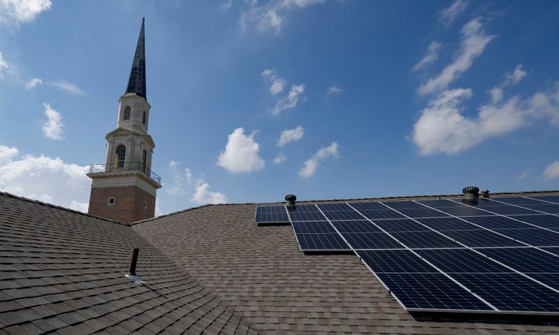 Solar panels are visible on First Grace United Methodist Church, that is part of the Community Lighthouse initiative that uses microgrids, a small-scale power system that can operate and provide electricity amid hurricanes, in New Orleans, Wednesday, Sept. 25, 2024. (AP Photo/Matthew Hinton)