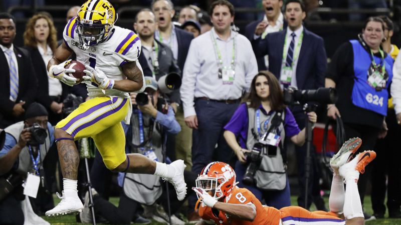 LSU wide receiver Ja'Marr Chase scores past Clemson cornerback A.J. Terrell in the first half in the college football playoff national championship game in 2020. (AP Photo/Sue Ogrocki)