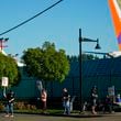 Boeing 737 Max aircrafts are seen behind fences as Boeing employees work the picket line while striking Tuesday, Sept. 24, 2024, next to the company's facilities in Renton, Wash. (AP Photo/Lindsey Wasson)