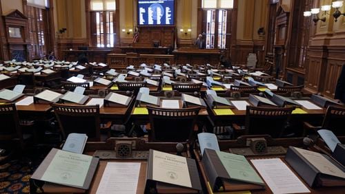 Binders filled with bills sit on senate desks before the session on Sine Die, the last day of the General Assembly in Atlanta on Monday, April 4, 2022. (Bob Andres / robert.andres@ajc.com)