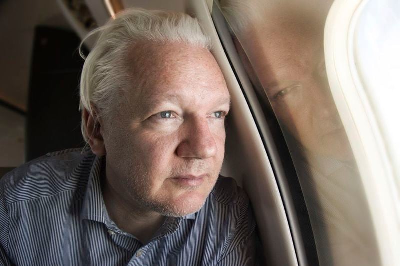 Screen grab taken from the X account of Wikileaks of Julian Assange on board a flight to Bangkok, Thailand, following his release from prison on Tuesday June 25, 2024. WikiLeaks founder Assange has arrived in Saipan ahead of an expected guilty plea in a deal with the U.S. Justice Department that will set him free to return home to Australia. (@WikiLeaks, via AP)