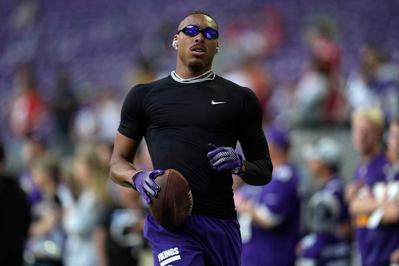 Minnesota Vikings wide receiver Justin Jefferson warms up before an NFL football game against the San Francisco 49ers, Sunday, Sept. 15, 2024, in Minneapolis. (AP Photo/Abbie Parr)