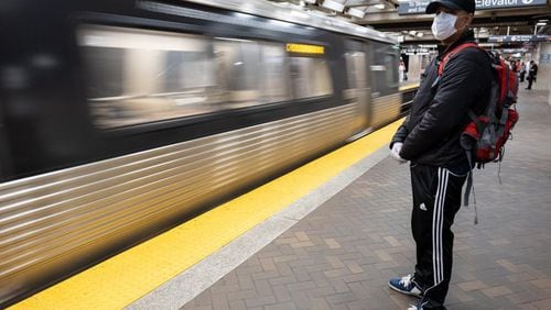 Metro Atlanta transit agencies encourage passengers to wear masks but don’t require it. (AJC FILE PHOTO BY BEN GRAY/Ben@bengray.com)