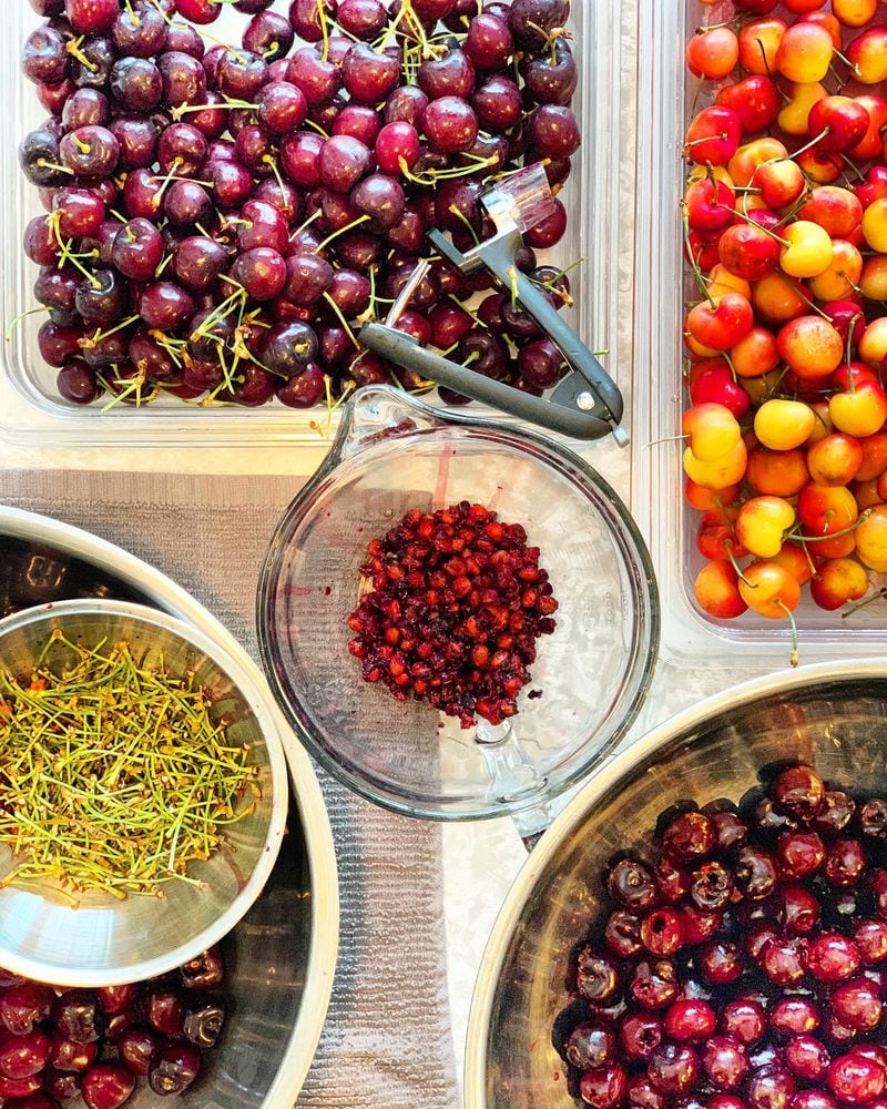 During a recent two-day canning session in Madison, Wisconsin, Asha Gomez helped her host Dennis Landon turn cherries into myriad preserves, including for pie filling. CONTRIBUTED BY ASHA GOMEZ