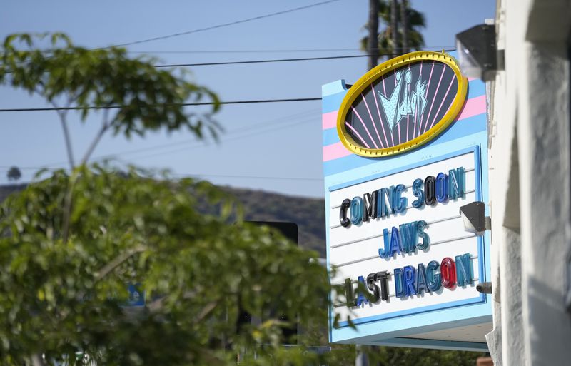 A marquee at the Eagle Theatre at Vidiots Foundation advertises screenings of "Jaws" and "Last Dragon," Tuesday, June 27, 2023, in Los Angeles. (AP Photo/Chris Pizzello)