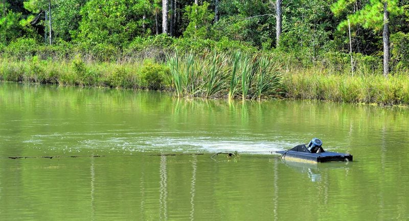 This is one of the aerators that runs constantly at Satilla Ponds to keep the water oxygenated for the catfish. Chris Hunt for The Atlanta Journal-Constitution 