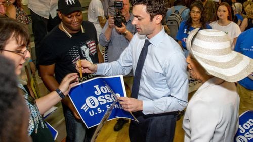 Jon Ossoff , Democratic candidate for one of Georgia's U.S. Senate seats, signs autographs during a  voter registration rally at the MLK Recreation Center in Atlanta on  Saturday, September 28, 2019. (Photo: STEVE SCHAEFER / SPECIAL TO THE AJC)