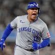 Kansas City Royals' Salvador Perez (13) reacts after hitting a solo home run against the New York Yankees during the fourth inning of Game 2 of the American League baseball playoff series, Monday, Oct. 7, 2024, in New York. (AP Photo/Seth Wenig)