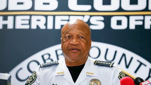 Cobb County Sheriff Craig Owens, shown in a 2022 file photo, announced Monday that a deputy recruit had been fired and arrested.