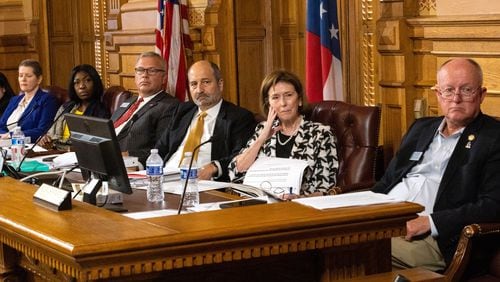 The State Election Board at an August meeting. (Arvin Temkar/The Atlanta Journal-Constitution)