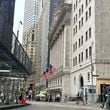 The New York Stock Exchange, center, is shown on Friday, Sept. 27, 2024, in New York. (AP Photo/Peter Morgan)