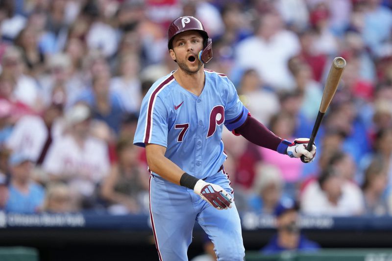 Philadelphia Phillies' Trea Turner reacts after flying out against Los Angeles Dodgers pitcher Landon Knack during the fifth inning of a baseball game, Thursday, July 11, 2024, in Philadelphia. (AP Photo/Matt Slocum)
