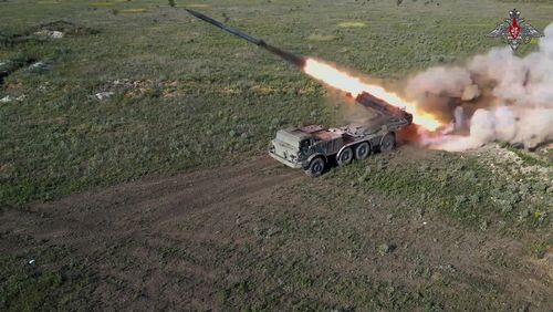 In this photo taken from video released by the Russian Defense Ministry on Friday, July 19, 2024, a Russian self-propelled multiple rocket launcher Uragan (Hurricane) fires toward Ukrainian position at an undisclosed location in Ukraine. (Russian Defense Ministry Press Service via AP)