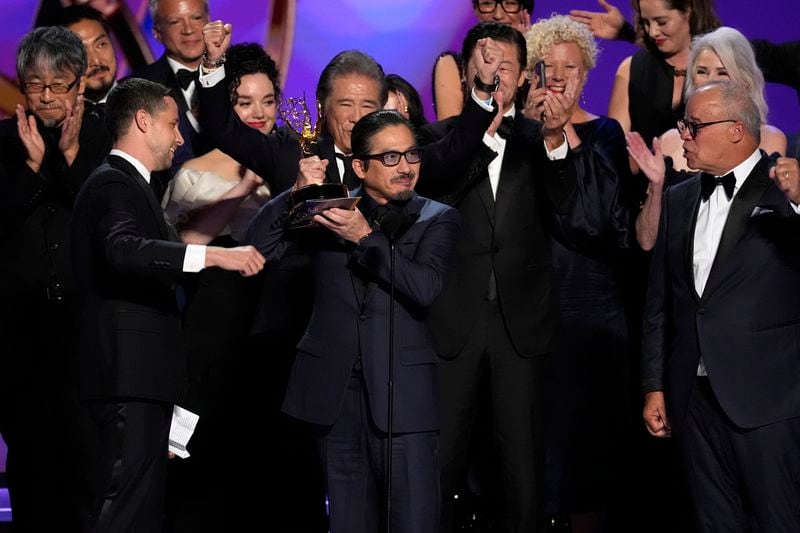 Justin Marks, left center, and Hiroyuki Sanada, center right, and the team from "Shogun" accepts the award for outstanding drama series during the 76th Primetime Emmy Awards on Sunday, Sept. 15, 2024, at the Peacock Theater in Los Angeles. (AP Photo/Chris Pizzello)