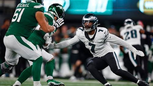 FILE - Philadelphia Eagles linebacker Haason Reddick (7) in action against New York Jets tight end Tyler Conklin (83) and offensive tackle Max Mitchell (61) during an NFL football game, Oct. 15, 2023, in East Rutherford NJ. (AP Photo/Rich Schultz, File)