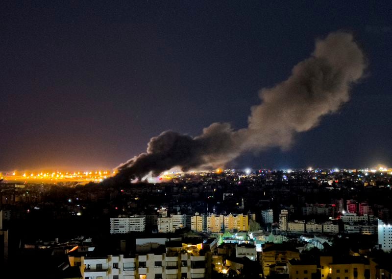 Smoke rises from an Israeli airstrike that hit the southern suburb of Beirut, Lebanon, Tuesday, Oct. 1, 2024. (AP Photo/Hussein Malla)