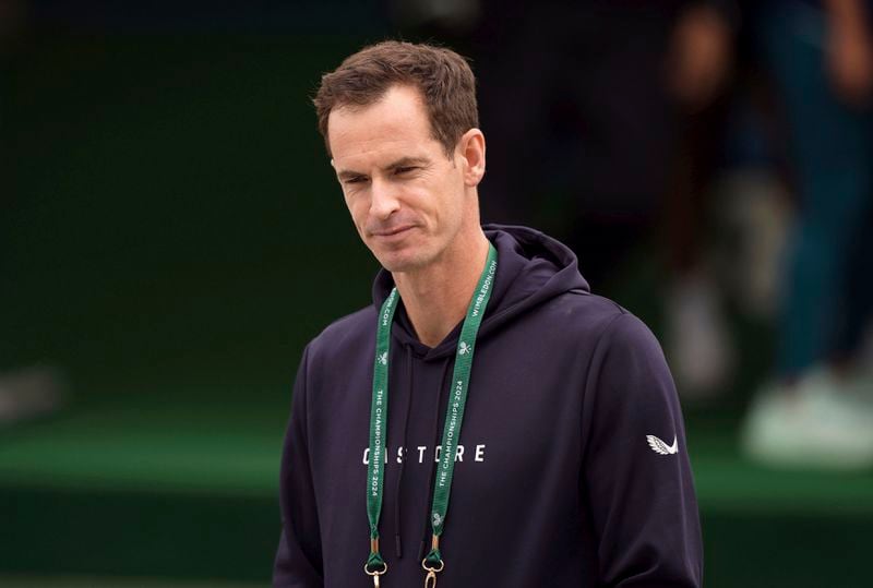 Britain's Andy Murray looks on in the warm up area on day two of the Wimbledon tennis championships, in London, Tuesday, July 2, 2024. Murray will play only doubles at his last appearance at the All England Club following his withdrawal from singles after back surgery. (Jordan Pettitt/PA via AP)