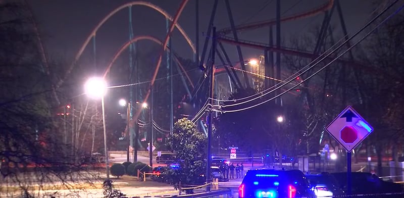 Cobb police got into a shootout with a person outside Six Flags on Saturday after a large crowd allegedly fought inside the park, authorities said.