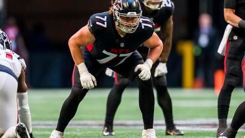 Atlanta Falcons offensive tackle Storm Norton (77) lines up during the second half of an NFL football game against the Houston Texans, Sunday, Oct. 8, 2023, in Atlanta. The Atlanta Falcons won 21-19. (AP Photo/Danny Karnik)