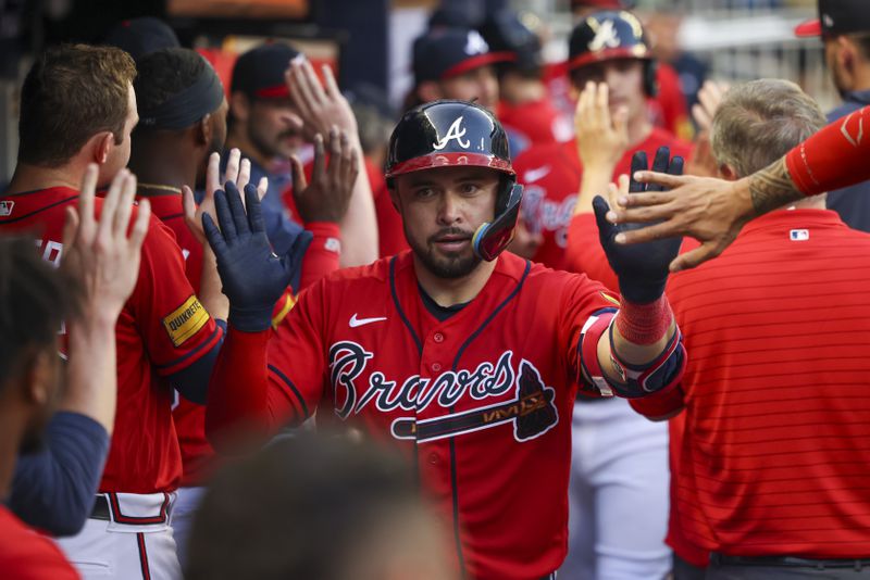 Atlanta Braves’ Travis d'Arnaud celebrates with teammates in the dugout after hitting a two-run home run during the third inning against the Colorado Rockies at Truist Park, Friday, June 16, 2023, in Atlanta. This was d’Arnaud’s second home run in the game. Jason Getz / Jason.Getz@ajc.com)