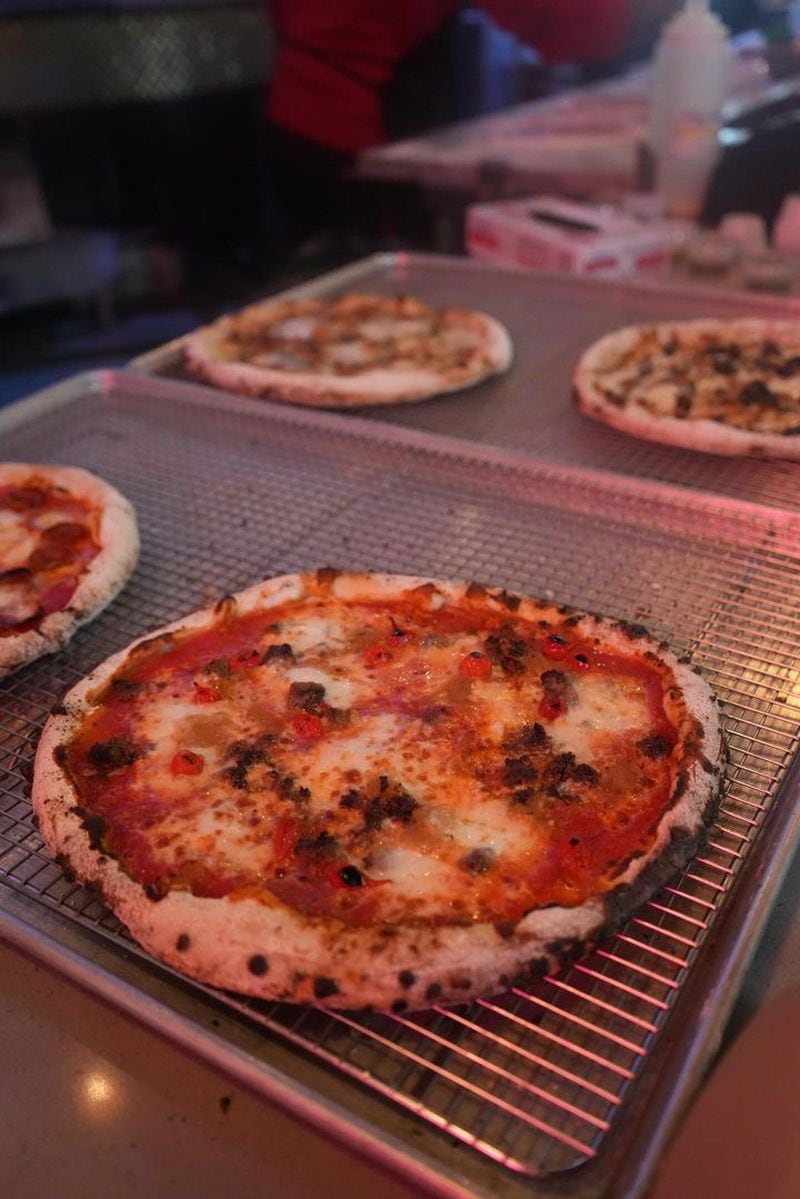 A freshly baked gluten-free pizza — free of cross-contamination from wheat — rests on a clean wire rack on Gluten Freedom Night at Monday Night Brewing. (Courtesy of Monday Night Brewing)