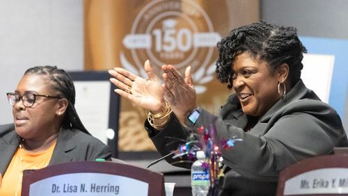 Lisa Herring applauds while speaking during her final meeting as Atlanta Public Schools superintendent on Aug. 7, 2023, in Atlanta. The board will transition Herring to a consultant and Danielle Battle as the interim superintendent. (Michael Blackshire/Michael.blackshire@ajc.com)