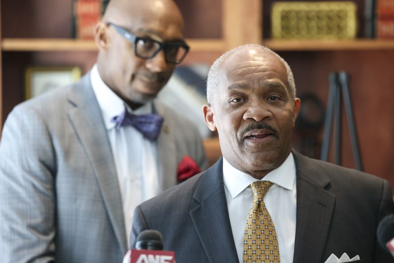 Attorney Harold Spence, right, speaks in front of fellow attorney Mawuli Davis during a press conference for Dino Walker, a Fulton inmate, who was stabbed to death at the Fulton County Jail in 2022, at the office of Davis Bozeman Johnson Law, Thursday, September 21, 2023, in Decatur, Ga. (Jason Getz / Jason.Getz@ajc.com)