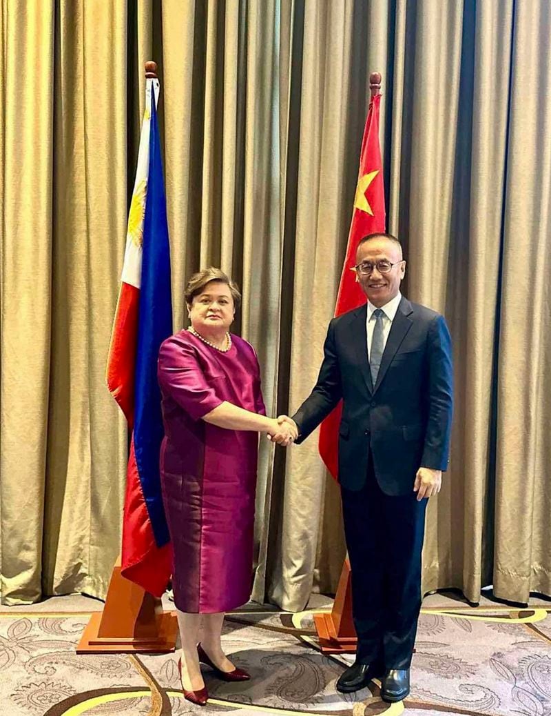 In this handout photo provided by the Philippine Department of Foreign Affairs, Philippine Foreign Affairs Undersecretary Ma. Theresa P. Lazaro, left, and Chinese Vice Foreign Minister Chen Xiaodong shake hands during the Philippines and China 9th Meeting of their Bilateral Consultation Mechanism on the South China Sea in Manila, Philippines, Tuesday July 2, 2024. China and the Philippines held a crucial meeting Tuesday to try to ease escalating tensions following their worst confrontation in the disputed South China Sea that caused injuries to Filipino navy personnel, damaged two military boats and sparked fears of a wider conflict that could involve Manila's treaty ally the United States.(Department of Foreign Affairs via AP)